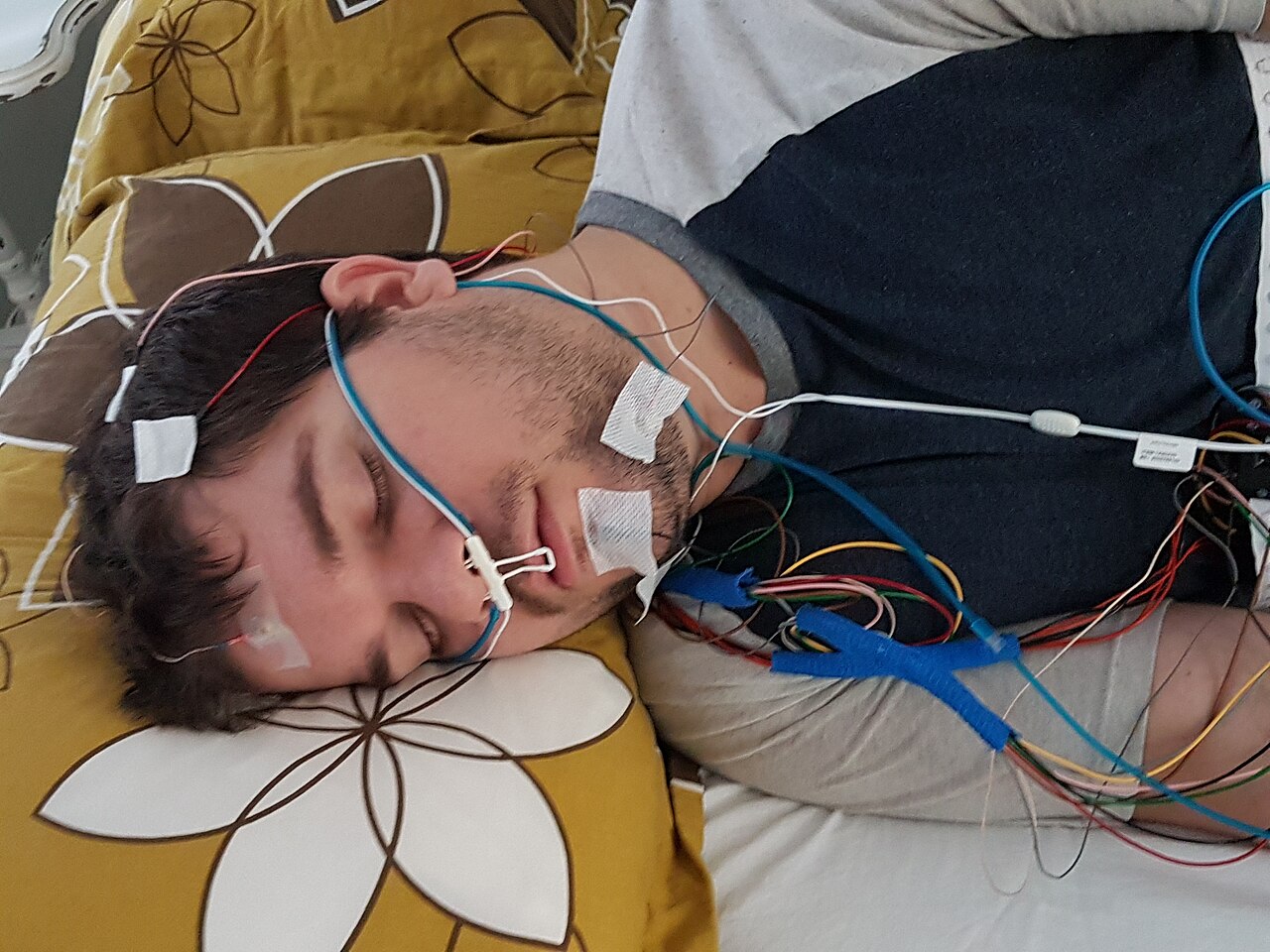 Person taking part in an overnight clinical sleep study